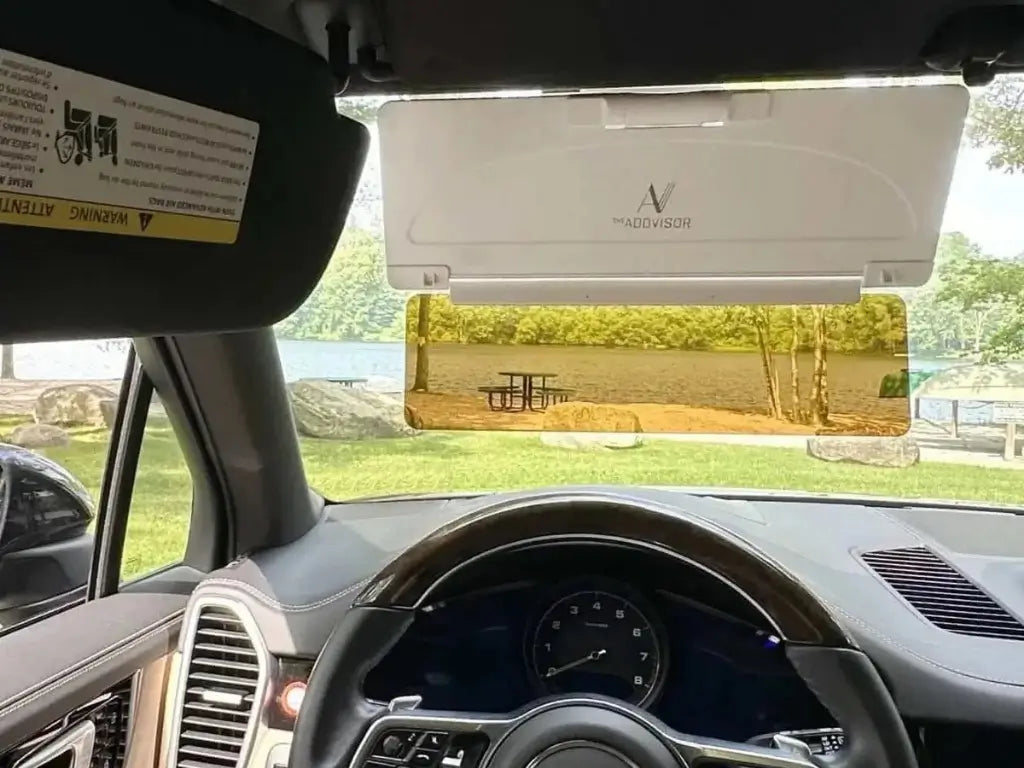 ADDVISOR Plus installed on car visor reducing windshield glare for safer driving with 2 direction sun protection in light color variation